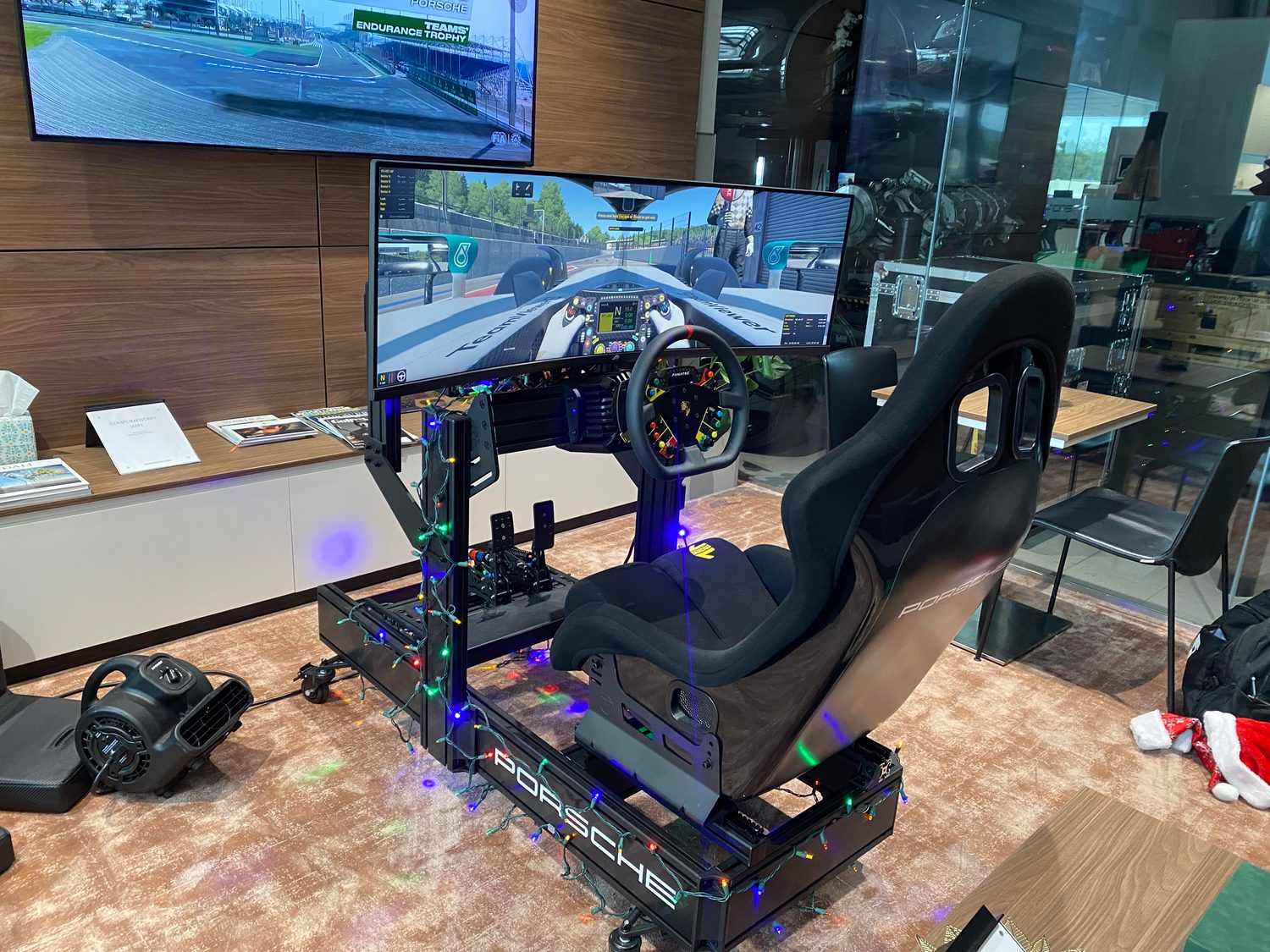 Porsche-branded simulator rig at a holiday activation