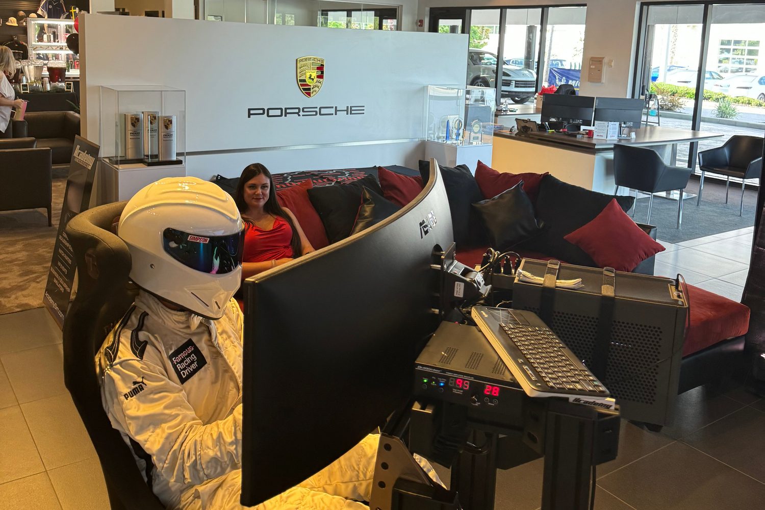 Academy staff running a dealership simulator activation